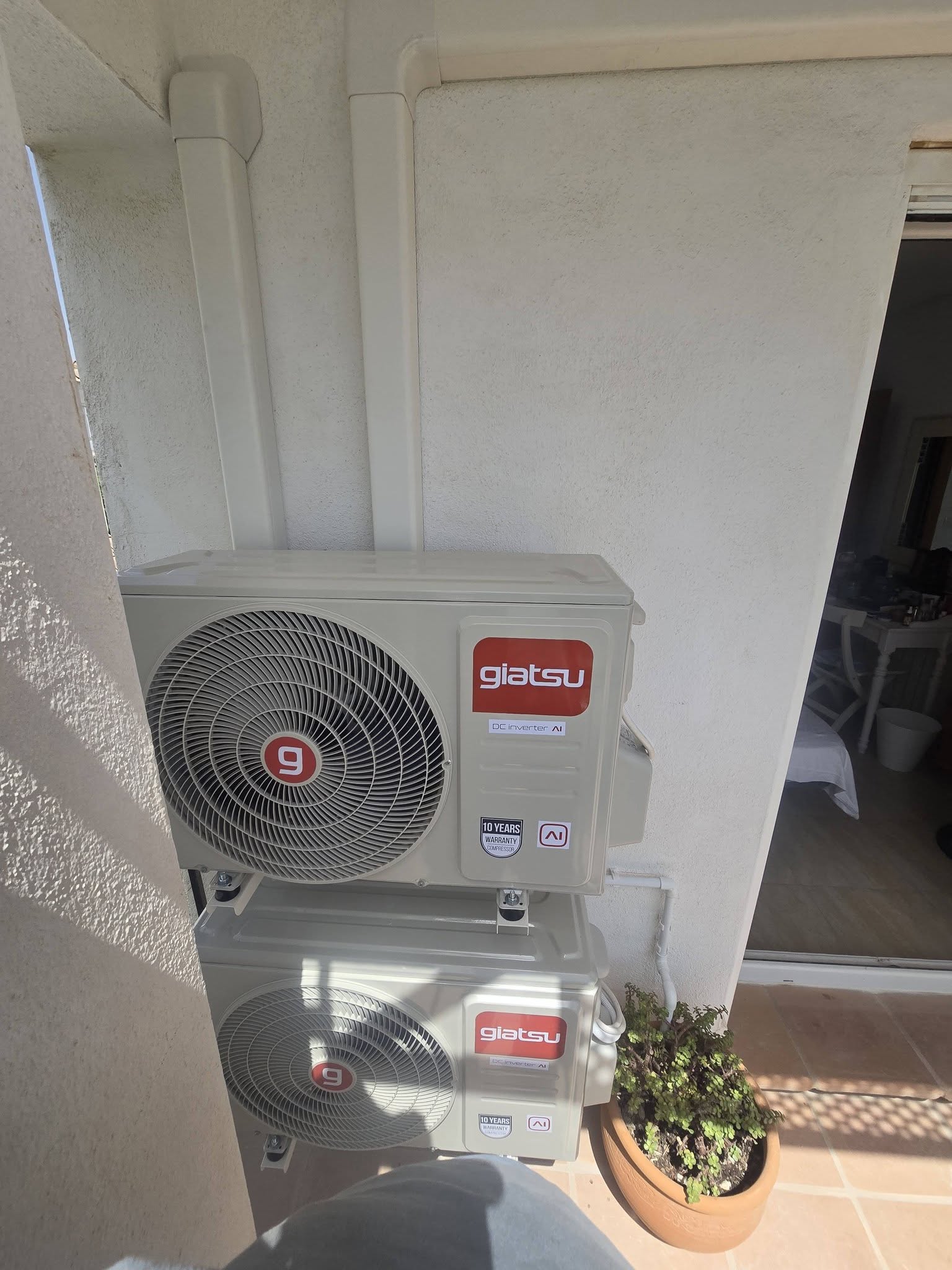 Neatly enclosed air conditioning pipework around a Costa Blanca property terrace